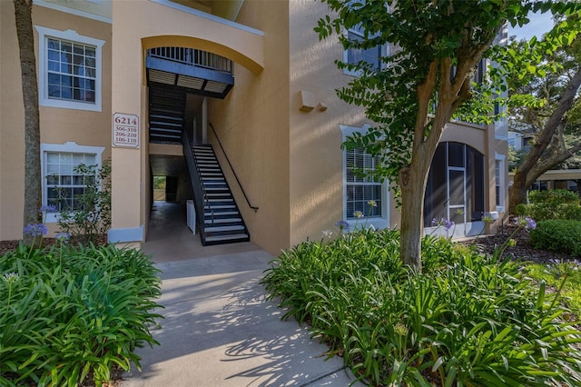 6214 Stevenson Dr Unit 106, Orlando, FL 32835 - entrance to property with stucco siding