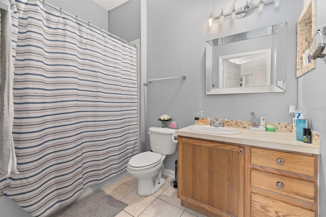 6214 Stevenson Dr Unit 106, Orlando, FL 32835 - full bathroom featuring vanity, tile patterned floors, toilet, and a shower with curtain