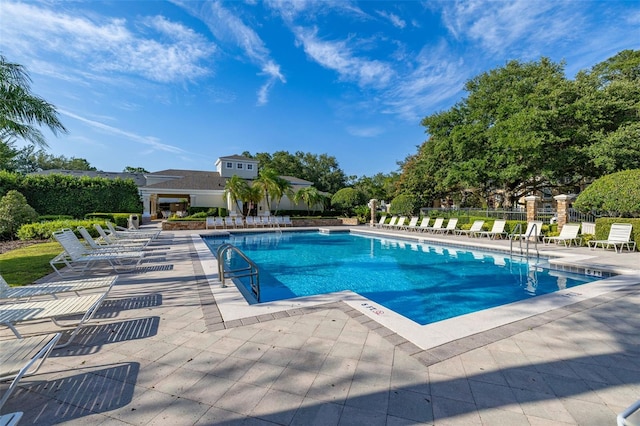 6214 Stevenson Dr Unit 106, Orlando, FL 32835 - community pool with a patio