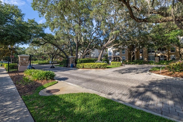 6214 Stevenson Dr Unit 106, Orlando, FL 32835 - view of property's community with a gate