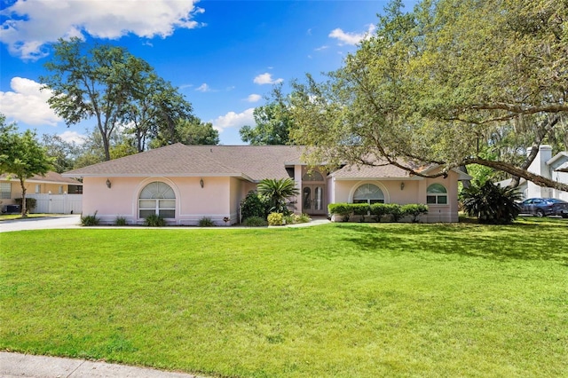 7222 Stanford Dr, Lakeland, FL 33809 - ranch-style house featuring stucco siding and roof with shingles