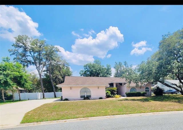 7222 Stanford Dr, Lakeland, FL 33809 - view of front of house featuring driveway and stucco siding