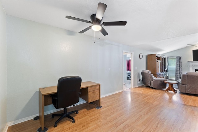 7222 Stanford Dr, Lakeland, FL 33809 - office featuring a ceiling fan, light wood-style flooring, baseboards, and lofted ceiling
