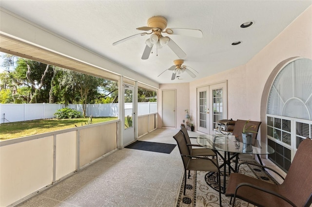 7222 Stanford Dr, Lakeland, FL 33809 - sunroom featuring french doors, a ceiling fan, and outdoor dining area