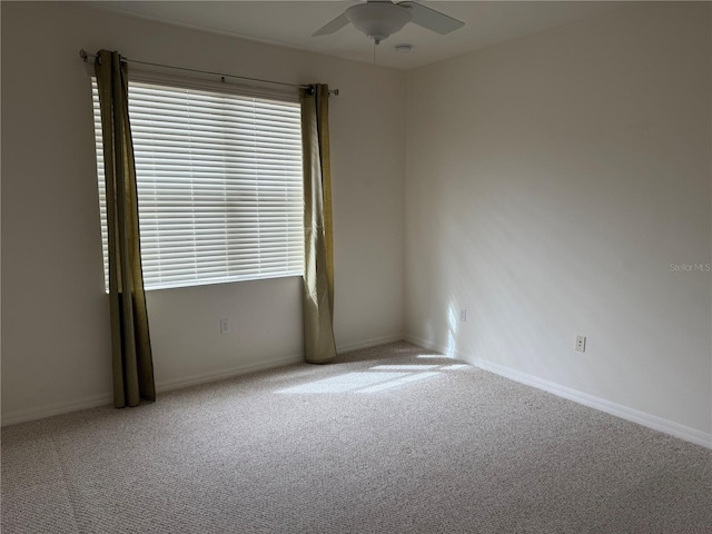 2495 Palm Tree Dr, Kissimmee, FL 34759 - unfurnished room featuring ceiling fan, carpet, and baseboards