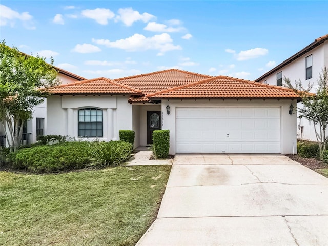16614 Lazy Breeze Loop, Clermont, FL 34714 - mediterranean / spanish house featuring stucco siding, an attached garage, concrete driveway, and a tiled roof