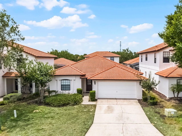 16614 Lazy Breeze Loop, Clermont, FL 34714 - mediterranean / spanish house featuring a garage, stucco siding, concrete driveway, a tiled roof, and a front lawn