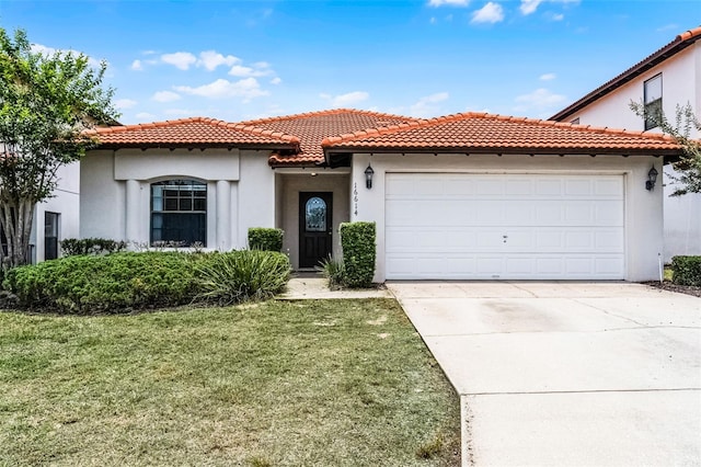 16614 Lazy Breeze Loop, Clermont, FL 34714 - mediterranean / spanish-style house with stucco siding, a garage, driveway, a tile roof, and a front lawn