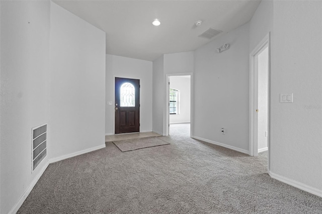 16614 Lazy Breeze Loop, Clermont, FL 34714 - entrance foyer with carpet floors and baseboards