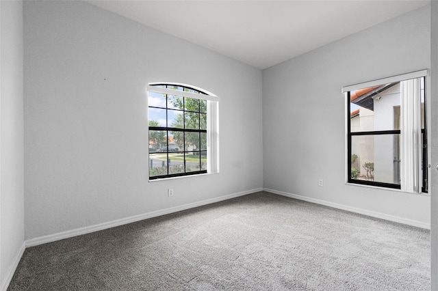 16614 Lazy Breeze Loop, Clermont, FL 34714 - spare room featuring carpet flooring and baseboards