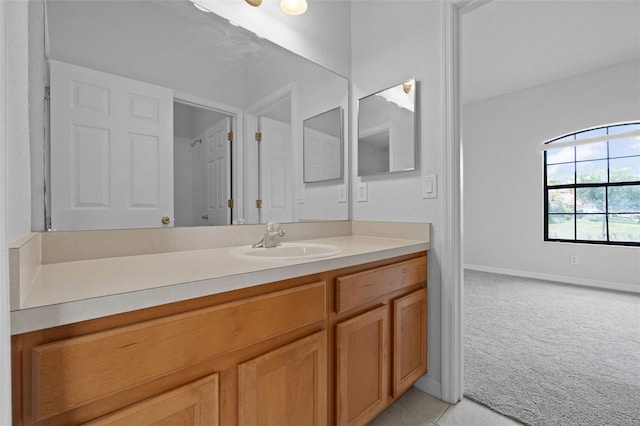 16614 Lazy Breeze Loop, Clermont, FL 34714 - bathroom featuring vanity and baseboards