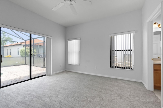 16614 Lazy Breeze Loop, Clermont, FL 34714 - unfurnished room featuring ceiling fan, light colored carpet, and baseboards