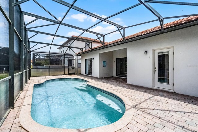 16614 Lazy Breeze Loop, Clermont, FL 34714 - outdoor pool with a patio area and a lanai