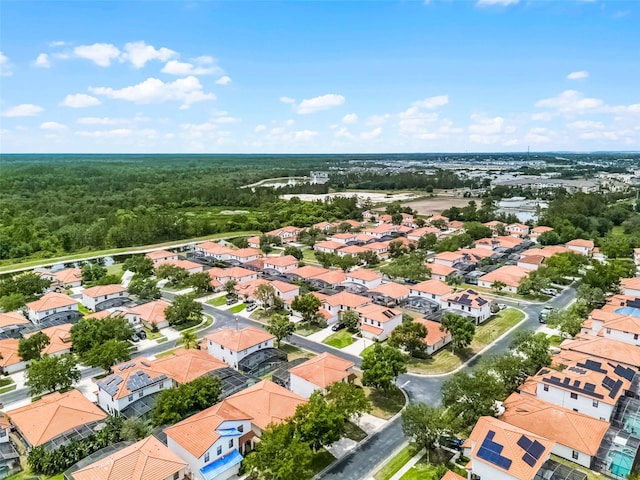 16614 Lazy Breeze Loop, Clermont, FL 34714 - aerial view of residential area featuring a heavily wooded area