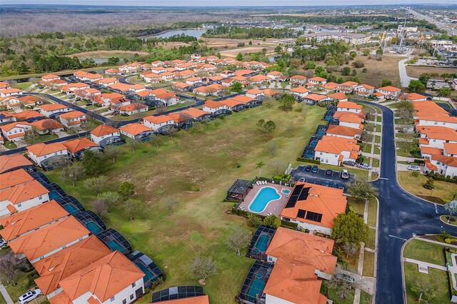 16614 Lazy Breeze Loop, Clermont, FL 34714 - aerial view of residential area with a nearby body of water and a pool