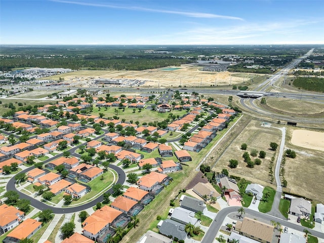 16614 Lazy Breeze Loop, Clermont, FL 34714 - aerial view of property and surrounding area featuring nearby suburban area