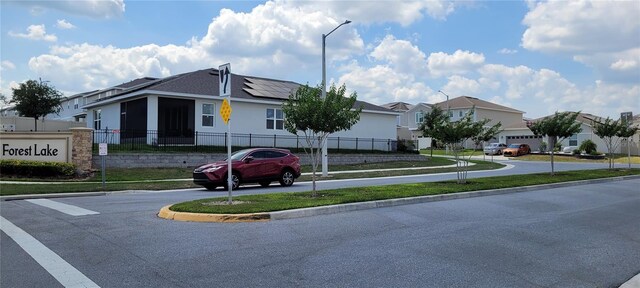 1556 Aspen Ave, Davenport, FL 33837 - view of front facade featuring a residential view