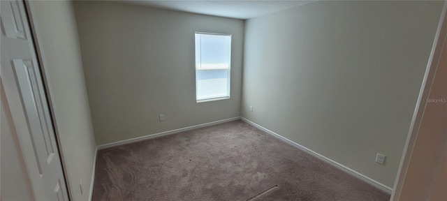 1556 Aspen Ave, Davenport, FL 33837 - carpeted spare room with baseboards