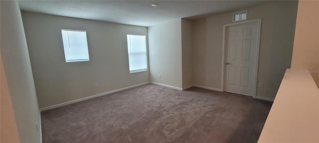 1556 Aspen Ave, Davenport, FL 33837 - carpeted empty room featuring baseboards