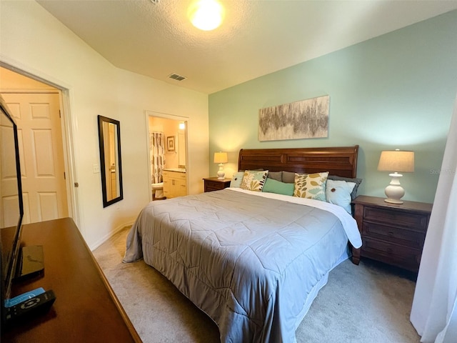 5356 Diplomat Ct Unit 108, Kissimmee, FL 34746 - bedroom with carpet flooring and ensuite bathroom