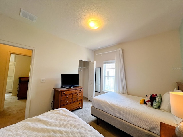 5356 Diplomat Ct Unit 108, Kissimmee, FL 34746 - bedroom featuring light carpet