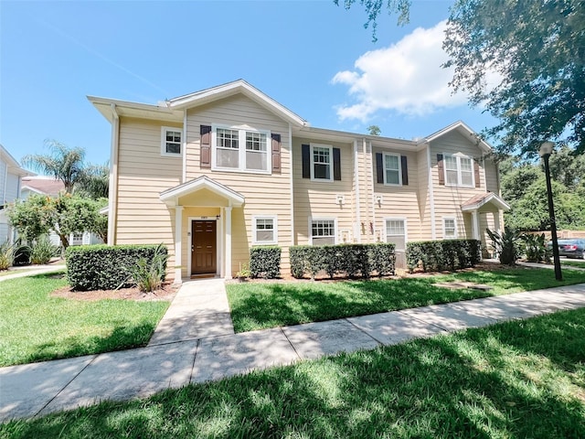 5356 Diplomat Ct Unit 108, Kissimmee, FL 34746 - view of front of property featuring a front lawn