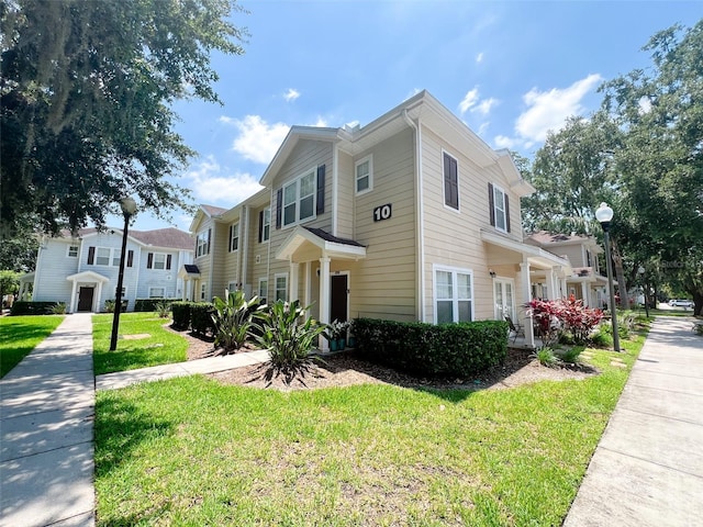 5356 Diplomat Ct Unit 108, Kissimmee, FL 34746 - view of front of home with a front lawn