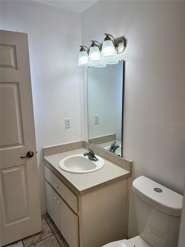 19 Rainbow Ln, Palm Coast, FL 32164 - bathroom with vanity and toilet