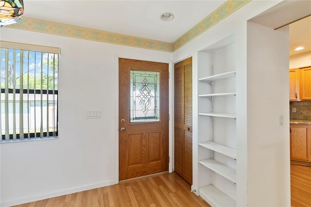 2740 Barker Rd, Saint Cloud, FL 34771 - foyer with light wood-style floors and recessed lighting