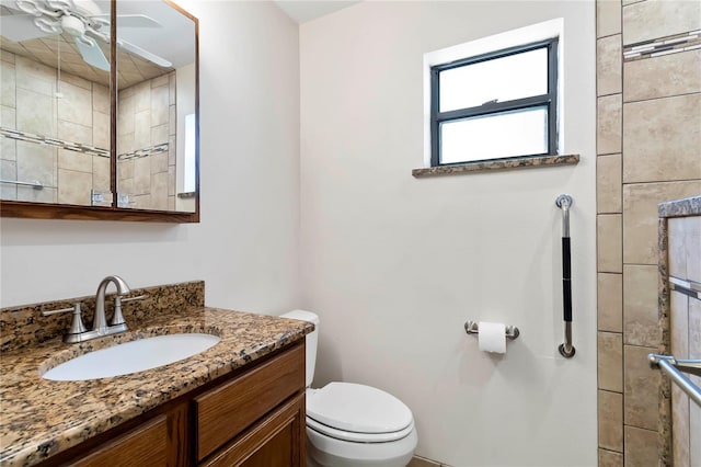 2740 Barker Rd, Saint Cloud, FL 34771 - full bath with vanity, ceiling fan, and tiled shower