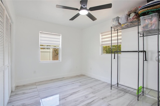 416 E Seminole Ave, Lake Wales, FL 33853 - unfurnished bedroom featuring baseboards and a ceiling fan