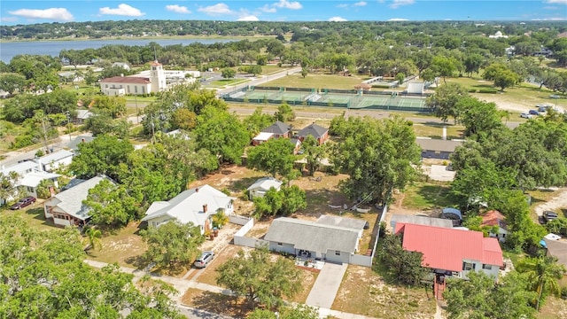 416 E Seminole Ave, Lake Wales, FL 33853 - aerial perspective of suburban area featuring a tree filled landscape and a nearby body of water