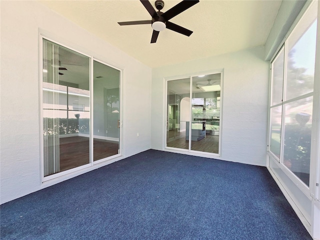 2312 Twickingham Ct, Clermont, FL 34711 - unfurnished sunroom with ceiling fan and carpet flooring