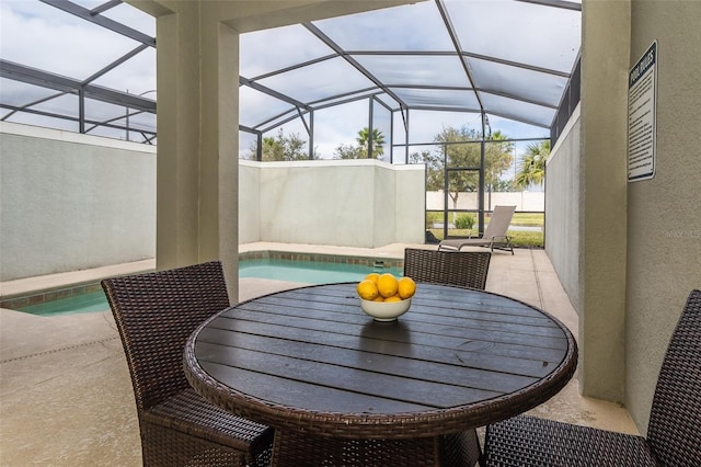 4875 Clock Tower Dr, Kissimmee, FL 34746 - view of patio with glass enclosure and outdoor dining space