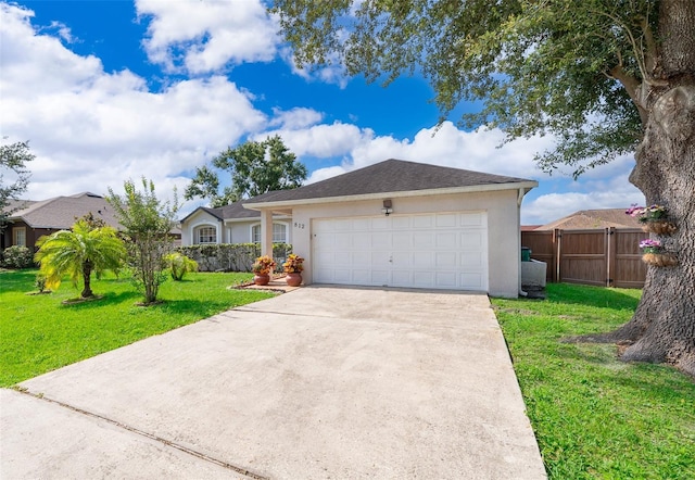 812 Adour Dr, Kissimmee, FL 34759 - ranch-style house featuring concrete driveway, an attached garage, and stucco siding