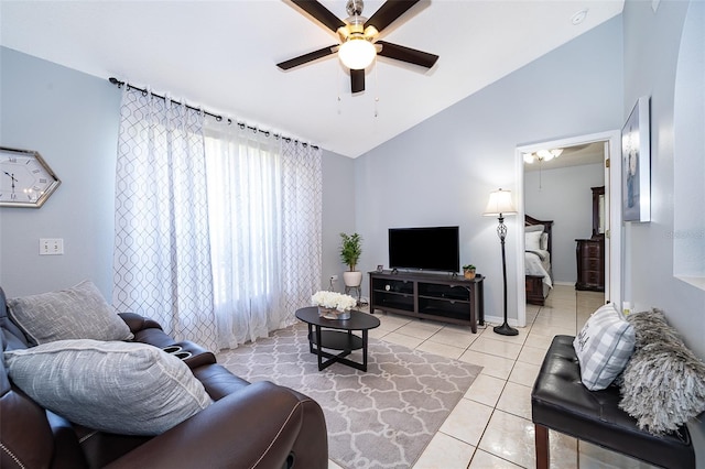 812 Adour Dr, Kissimmee, FL 34759 - living room with vaulted ceiling, ceiling fan, and light tile patterned floors