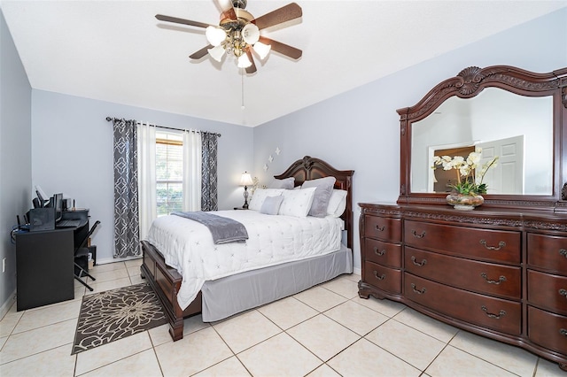 812 Adour Dr, Kissimmee, FL 34759 - bedroom with light tile patterned floors and ceiling fan
