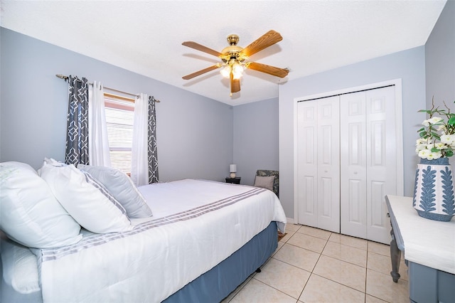 812 Adour Dr, Kissimmee, FL 34759 - bedroom with a closet, light tile patterned floors, and ceiling fan