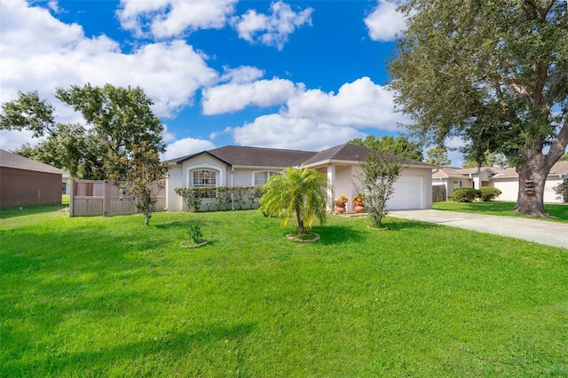 812 Adour Dr, Kissimmee, FL 34759 - ranch-style home featuring driveway, an attached garage, and stucco siding