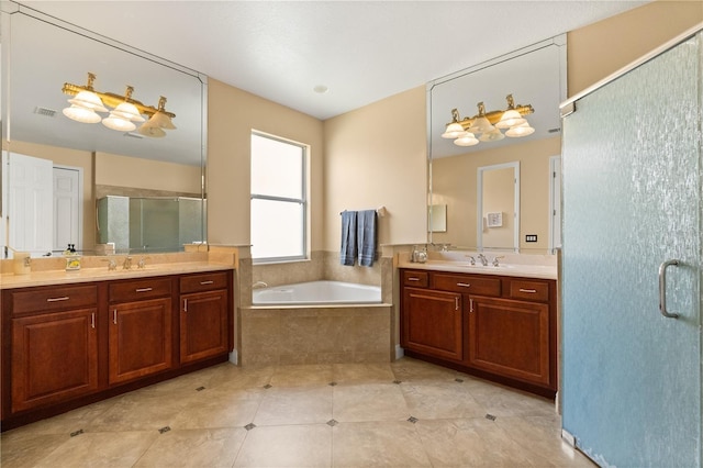 3759 Eagle Isle Cir, Kissimmee, FL 34746 - full bath with a stall shower, two vanities, a bath, and tile patterned flooring