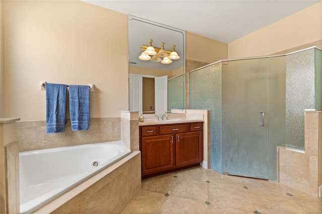 3759 Eagle Isle Cir, Kissimmee, FL 34746 - full bath with a stall shower, vanity, a bath, and tile patterned flooring