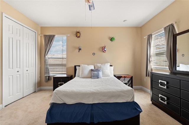 3759 Eagle Isle Cir, Kissimmee, FL 34746 - bedroom featuring light colored carpet, a closet, and baseboards