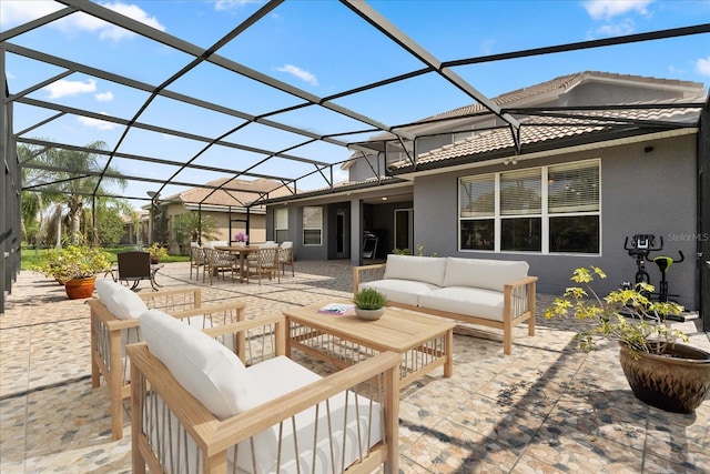 3759 Eagle Isle Cir, Kissimmee, FL 34746 - view of patio / terrace featuring an outdoor hangout area, outdoor dining area, and glass enclosure