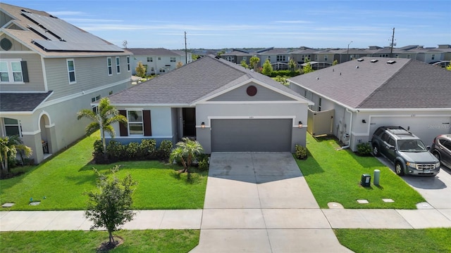 685 Overpool Ave, Davenport, FL 33896 - view of front of house with a residential view, a garage, driveway, and a front lawn