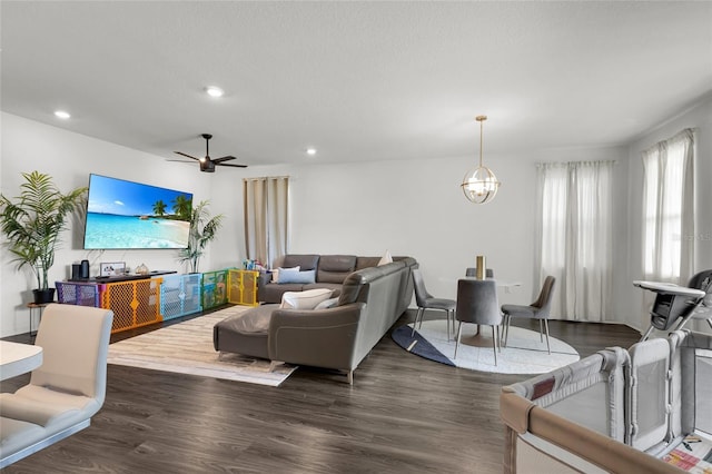 685 Overpool Ave, Davenport, FL 33896 - living area featuring a chandelier, recessed lighting, wood finished floors, and a ceiling fan