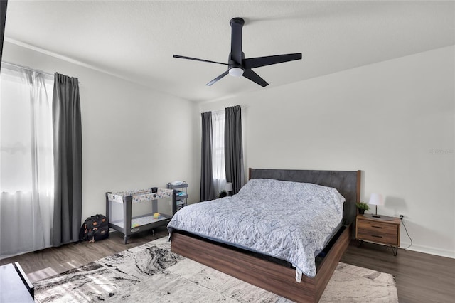 685 Overpool Ave, Davenport, FL 33896 - bedroom with wood finished floors and a ceiling fan