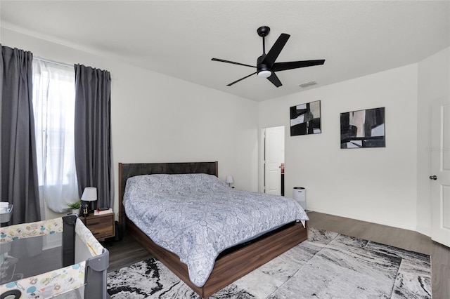 685 Overpool Ave, Davenport, FL 33896 - bedroom featuring wood finished floors and a ceiling fan