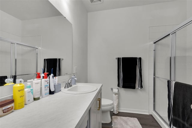685 Overpool Ave, Davenport, FL 33896 - full bath with vanity, a stall shower, and wood finished floors