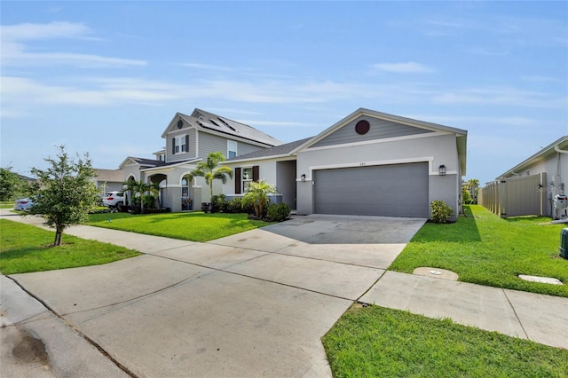 685 Overpool Ave, Davenport, FL 33896 - view of front of property with a garage, driveway, and stucco siding