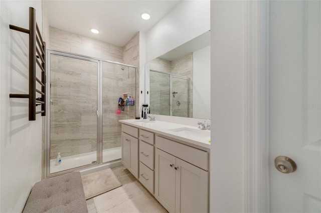 2224 Celebration Blvd, Celebration, FL 34747 - bathroom featuring a shower stall and double vanity